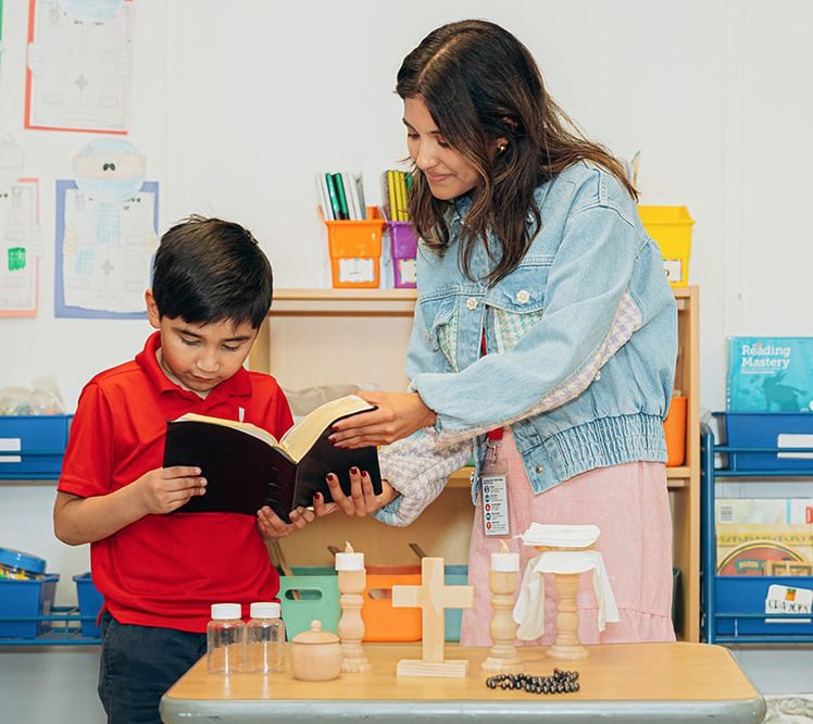 Children joyfully engaging with catechetical content.