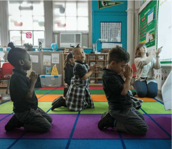 Diverse children participating in faith formation